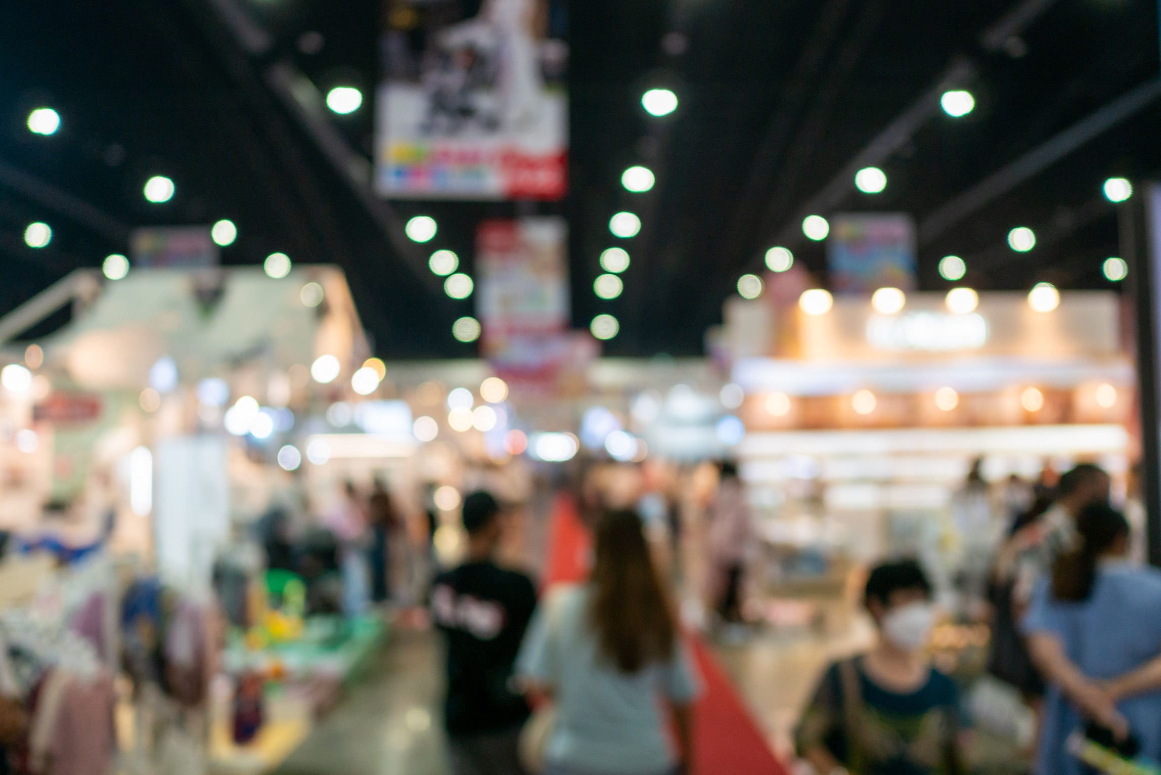 A bustling trade show scene showcasing various displays and networking opportunities.